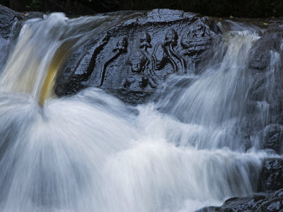 Lotus Flowers And Hindu Deities Carved In Stone At Kbal Spean by Robert Clark Pricing Limited Edition Print image
