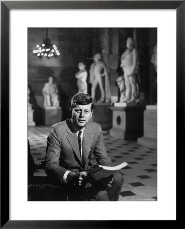 Senator John F. Kennedy Seated In Museum With Statues by Hank Walker Pricing Limited Edition Print image