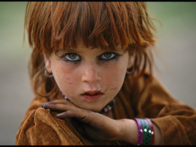 A Young Girl Wearing Makeup by Reza Pricing Limited Edition Print image