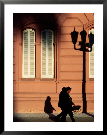 Pedestrian And Shadows Outside Casa Rosada, Plaza De Mayo, Buenos Aires, Argentina by Michael Taylor Pricing Limited Edition Print image