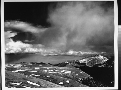 Landscape With Clouds And Partially Snow-Covered Rocks In Rocky Mountain National Park by Ansel Adams Pricing Limited Edition Print image
