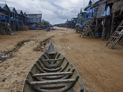 Houses Built On Stilts Stand High And Dry In Kompong Phluk by Robert Clark Pricing Limited Edition Print image