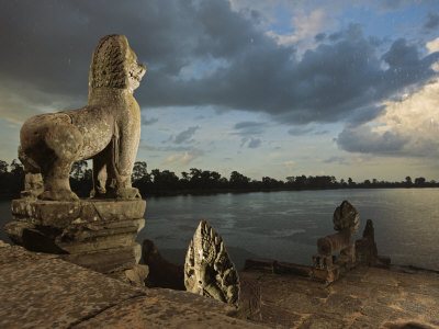 Monsoon Clouds Spill Rain Into The Srah Srang Reservoir by Robert Clark Pricing Limited Edition Print image