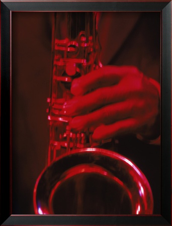 Close-Up Of Man Playing Saxophone In Jazz Club by Gary Conner Pricing Limited Edition Print image