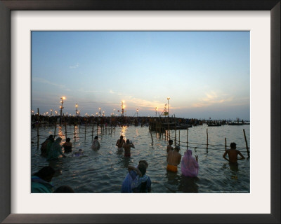 Hindu Devotees Bathe In The River Ganges On A Hindu Festival In Allahabad, India, January 14, 2007 by Rajesh Kumar Singh Pricing Limited Edition Print image