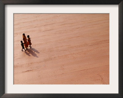 A Woman And Two Children Walk On A Newly Constructed Road In Sonapur by Anupam Nath Pricing Limited Edition Print image