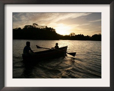 Two Children Sail In The Cocibolca Lake, Managua, Nicaragua by Esteban Felix Pricing Limited Edition Print image