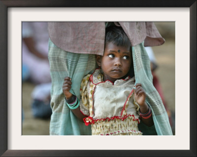 A Displaced Tamil Child Hangs To Her Father's Sarong by Gemunu Amarasinghe Pricing Limited Edition Print image