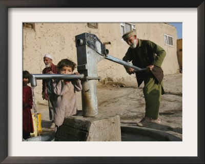 An Elderly Man Pumps Water From A Public Well In Kabul, Afghanistan, Friday, September 22, 2006 by Rodrigo Abd Pricing Limited Edition Print image
