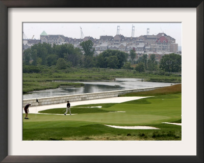 Golfers Play On The 18Th Green At Liberty National Golf Club In Jersey City, Nj, June 14, 2006 by Mike Derer Pricing Limited Edition Print image