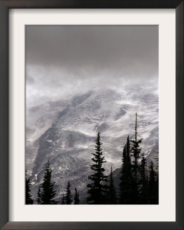 Emmons Glacier Reflects A Bit Of Sunlight As Clouds Cover The Summit Of Mount Rainier by John Froschauer Pricing Limited Edition Print image