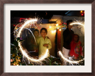 Children Light Firecrackers For The Hindu Festival Of Diwali In New Delhi, India, Oct. 20, 2006 by Manish Swarup Pricing Limited Edition Print image