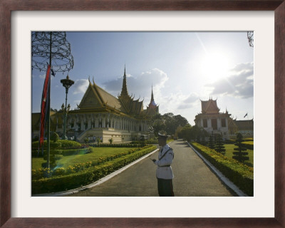 Royal Palace Guard Stands During Coronation Ceremonies In Phnom Penh Thursday October 28, 2004 by Andy Eames Pricing Limited Edition Print image