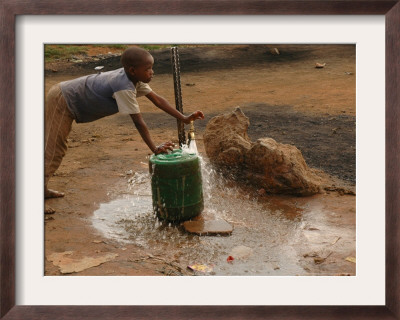 A Child Fills A Container With Water For Domestic Use by Mujahid Safodien Pricing Limited Edition Print image