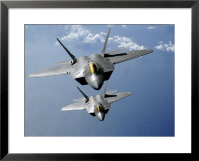 Two F-22 Raptors Fly Over The Pacific Ocean by Stocktrek Images Pricing Limited Edition Print image