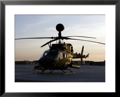 Oh-58D Kiowa During Sunset by Stocktrek Images Pricing Limited Edition Print image