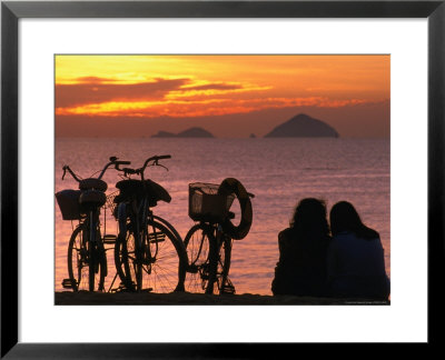 Couple At Beach At Sunrise, Nha Trang, Vietnam by John Banagan Pricing Limited Edition Print image