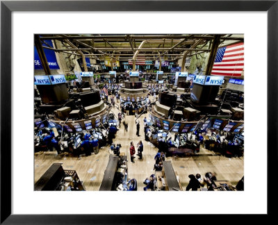 An High Angle View Of The New York Stock Exchange's Trading Floor by Justin Guariglia Pricing Limited Edition Print image