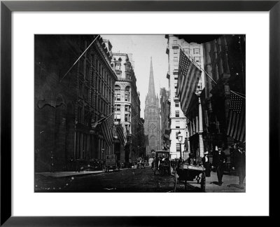 People And Horse Drawn Carriages On Wall St, Where American Flags Are Flying From Several Buildings by George B. Brainerd Pricing Limited Edition Print image