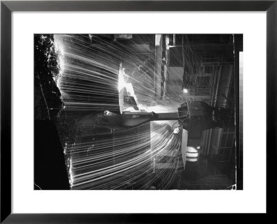 Molten Steel Being Poured From An Open Hearth Furnace At Carnegie Illinois Steel Mill by Andreas Feininger Pricing Limited Edition Print image