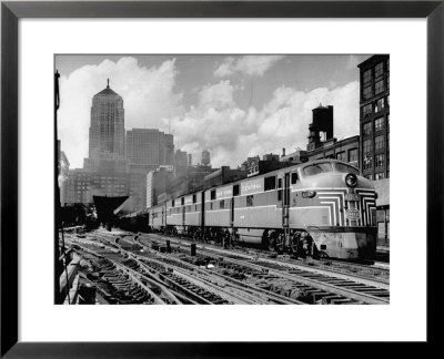 New York Central Passenger Train With A Streamlined Locomotive Leaving Chicago Station by Andreas Feininger Pricing Limited Edition Print image
