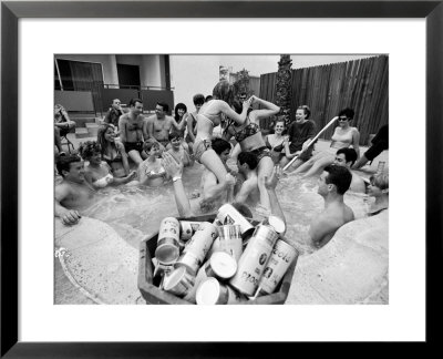 Pair Of Couples Chicken Fighting In A Crowded Jacuzzi Pool During A Beer Fueled Party by Arthur Schatz Pricing Limited Edition Print image