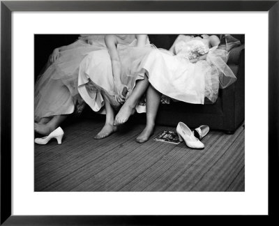 Teenage Girls Resting Feet At First Formal Dance At The Naval Armory by Cornell Capa Pricing Limited Edition Print image