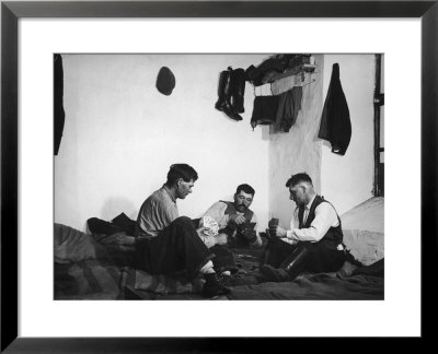 Trio Of Czech Peasants Playing Cards In The Season Workers House On The Anyala Farm by Margaret Bourke-White Pricing Limited Edition Print image