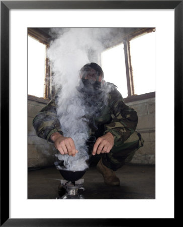 A Marine Fills The Marine Corps Air Station Futenma Gas Chamber With More Cs Gas by Stocktrek Images Pricing Limited Edition Print image