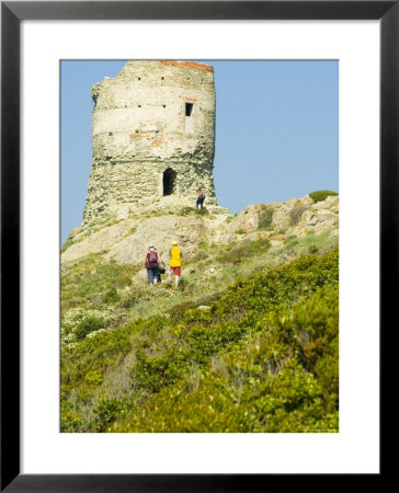 Family Walking In Blooming Maquis To Genoese Tower, Le Sentier Des Douaniers, Cap Corse by Trish Drury Pricing Limited Edition Print image