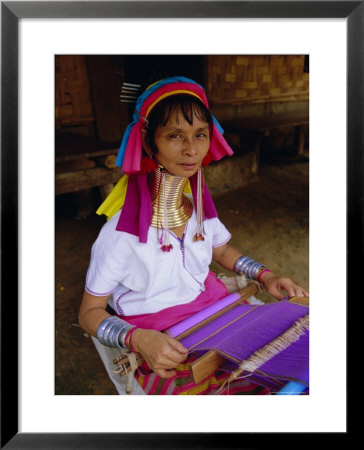Portrait Of A 'Long Necked' Padaung Tribe Woman Weaving On A Hand Held Loom, Mae Hong Son Province by Gavin Hellier Pricing Limited Edition Print image