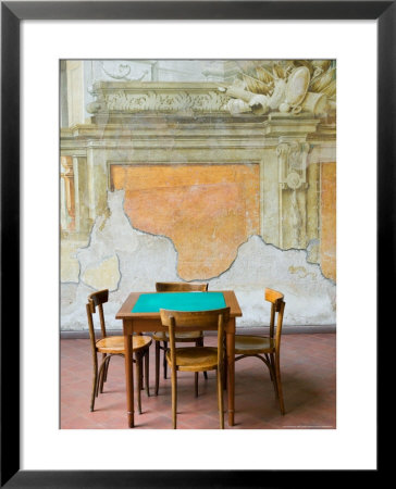 Table And Wall At 15Th Century Sedile Dominova Social Club, Sorrento, Campania, Italy by Walter Bibikow Pricing Limited Edition Print image