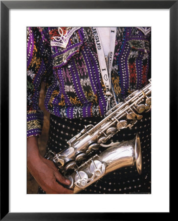 Man's Traditional Dress And Saxophone, Antigua, Guatemala by John & Lisa Merrill Pricing Limited Edition Print image