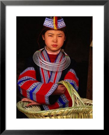 Girl In Traditional Dress Carrying Basket, Anshun, China by Keren Su Pricing Limited Edition Print image