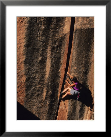 Climber Ascends An Off Width In The Utah Desert by Bill Hatcher Pricing Limited Edition Print image