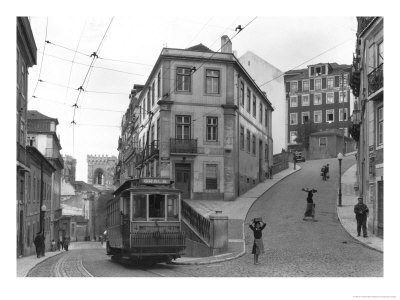 Lisbon Street Scene With Tramcar by W. Robert Moore Pricing Limited Edition Print image