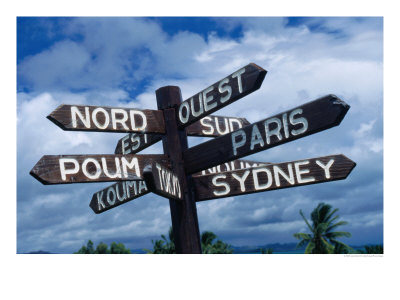 Sign Showing Directions To Other Cities In World, Koumac, New Caledonia by Jean-Bernard Carillet Pricing Limited Edition Print image