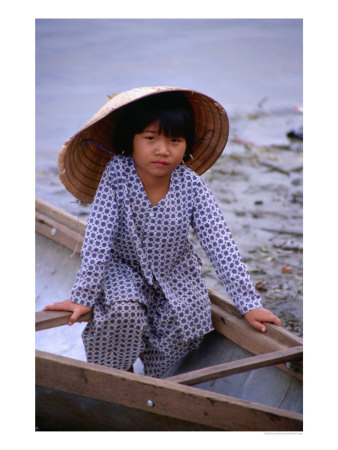 Girl In Canoe By Perfume River, Looking At Camera, Hue, Vietnam by Craig Pershouse Pricing Limited Edition Print image