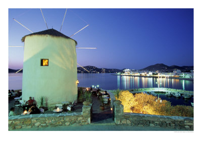 Converted Windmill And Cafe At Night, Greece by Walter Bibikow Pricing Limited Edition Print image