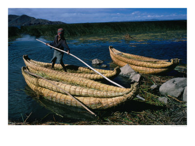 Aymara Boy On Reed Boat On Lake, Lake Titicaca, Puno, Peru by Eric Wheater Pricing Limited Edition Print image