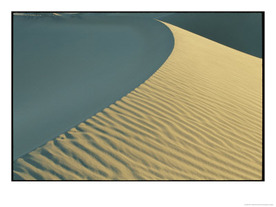 A Sand Dune Is Highlighted By The Rising Sun by Marc Moritsch Pricing Limited Edition Print image