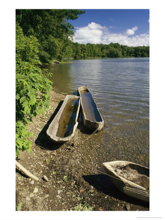 Log Canoes On The Banks Of A Recreated Iroquois Fishing Camp by Raymond Gehman Pricing Limited Edition Print image