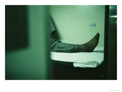 Chinese Man Lies On A Bunk On A Train Wearing Sheer Black Socks by Eightfish Pricing Limited Edition Print image