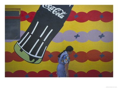 Local Woman Walks Past An Advertisement, Oaxaca, Mexico by Judith Haden Pricing Limited Edition Print image