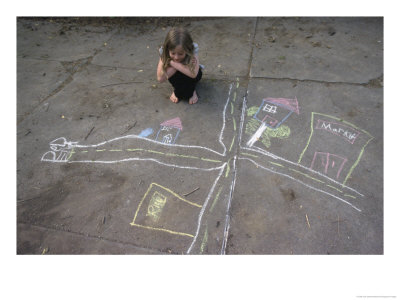 A Young Girl Admires A Drawing That She Did With Sidewalk Chalk by Joel Sartore Pricing Limited Edition Print image
