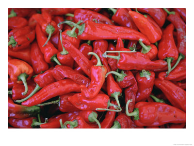 A Large Group Of Bright Red Chili Peppers by Joel Sartore Pricing Limited Edition Print image