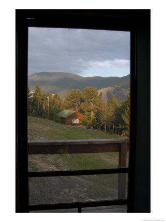 Looking Through A Doorway To The Mountains Of Montana, Red Lodge, Montana, United States by Stacy Gold Pricing Limited Edition Print image
