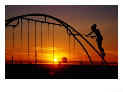 Girl On A Swing At Sunset, Venice Beach Boardwalk, Los Angeles, United States Of America by Richard Cummins Pricing Limited Edition Print image