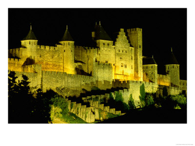 Chateau Comtal And Medieval Walled City At Night Above New Town, Carcassonne, France by Dallas Stribley Pricing Limited Edition Print image