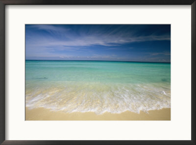 Clear Blue Water And Wispy Clouds Along The Beach At Cancun by Michael Melford Pricing Limited Edition Print image